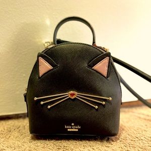 Kate Spade purse cat’s meow cat.
